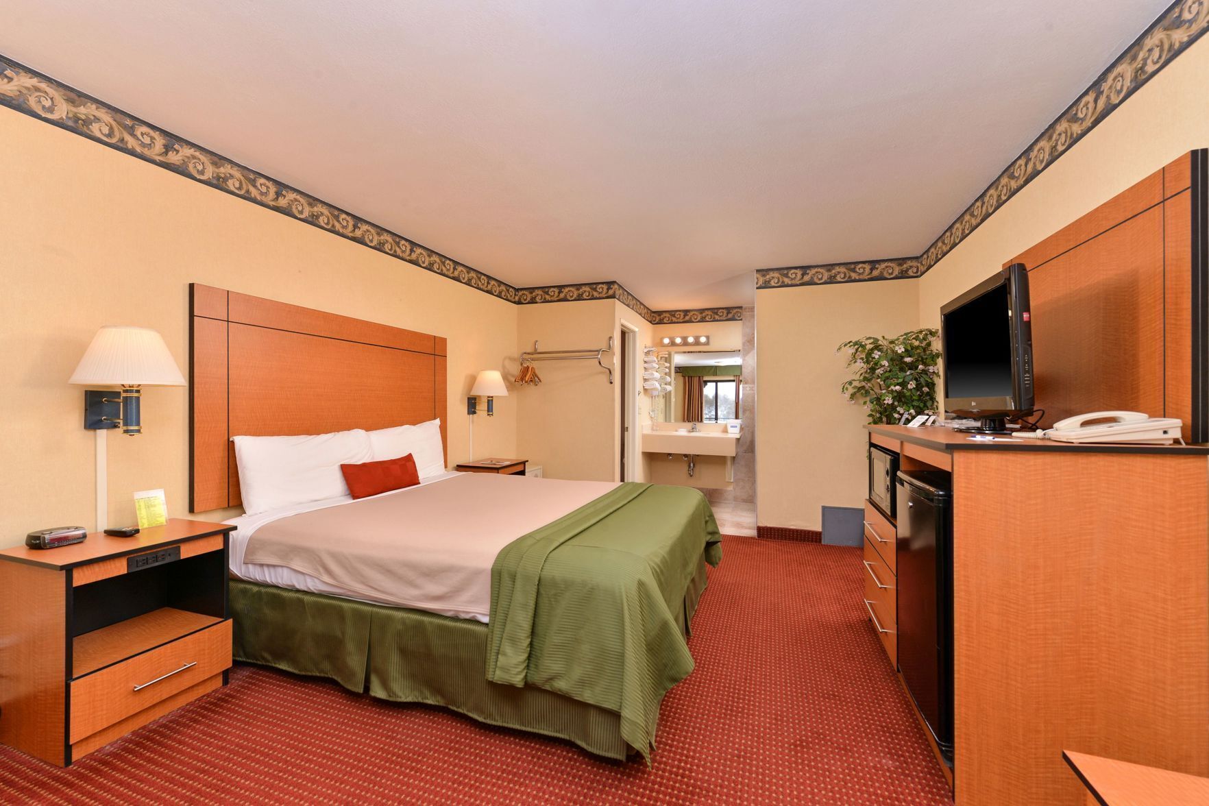 In-room safe, desk, iron/ironing board, free cribs/infant beds