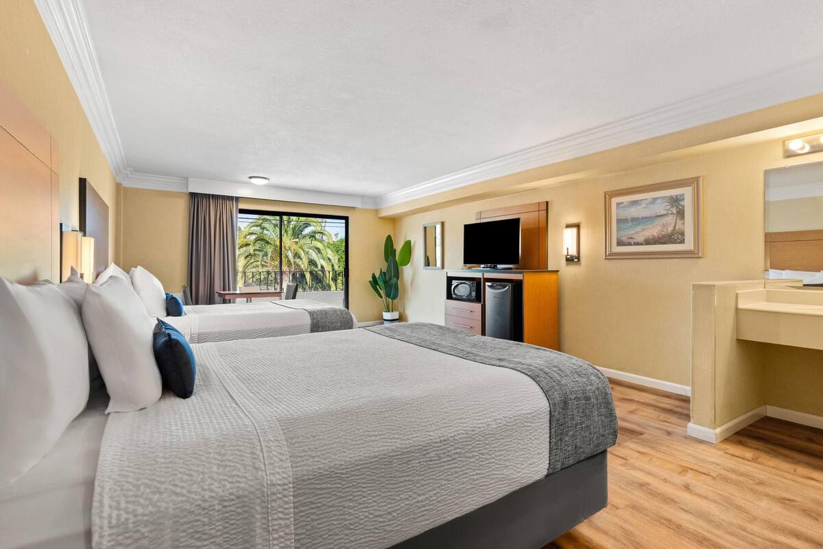 Room, 2 Queen Beds, Non Smoking, Balcony | In-room safe, desk, iron/ironing board, free cots/infant beds