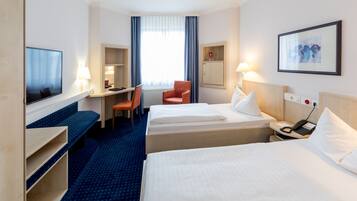 Literie hypoallergénique, coffres-forts dans les chambres, bureau