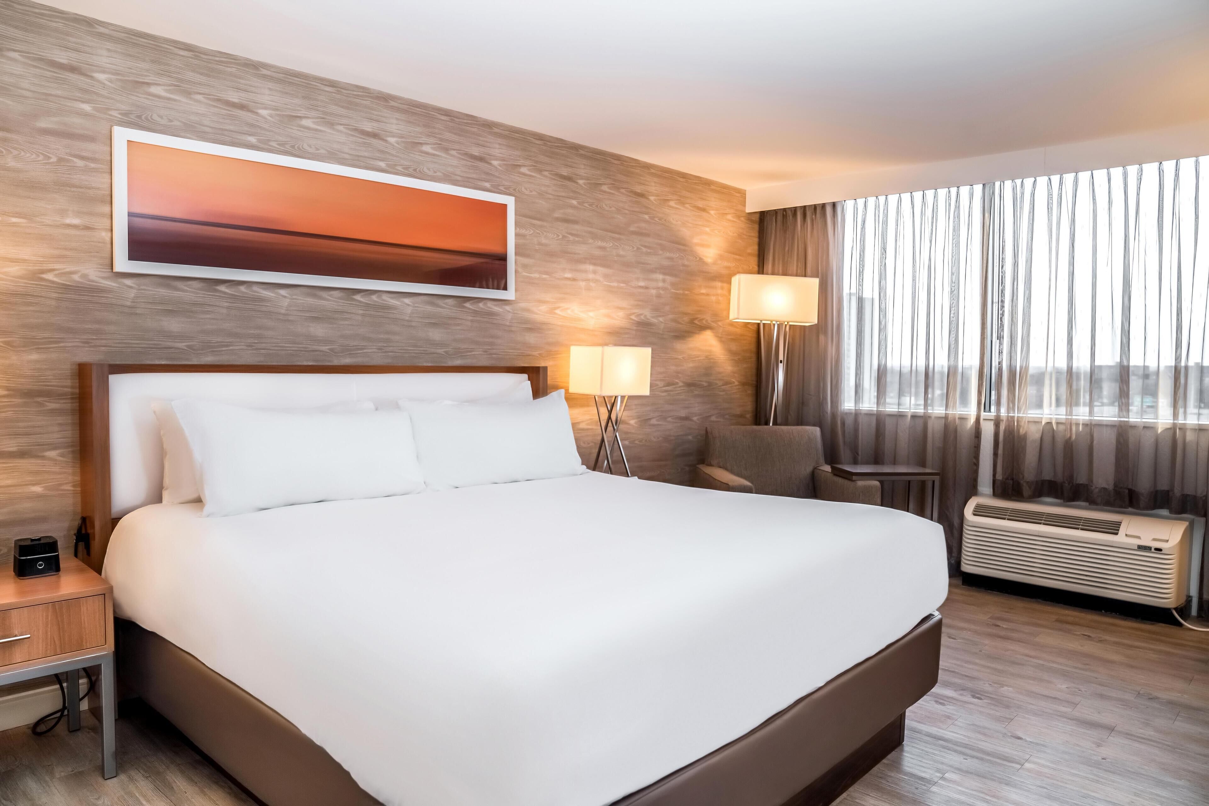 Room, 1 King Bed | Pillowtop beds, in-room safe, desk, blackout drapes