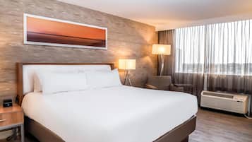 Room, 1 King Bed | Pillowtop beds, in-room safe, desk, blackout drapes