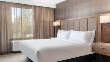 Suite, 1 King Bed | Pillow-top beds, in-room safe, desk, blackout curtains