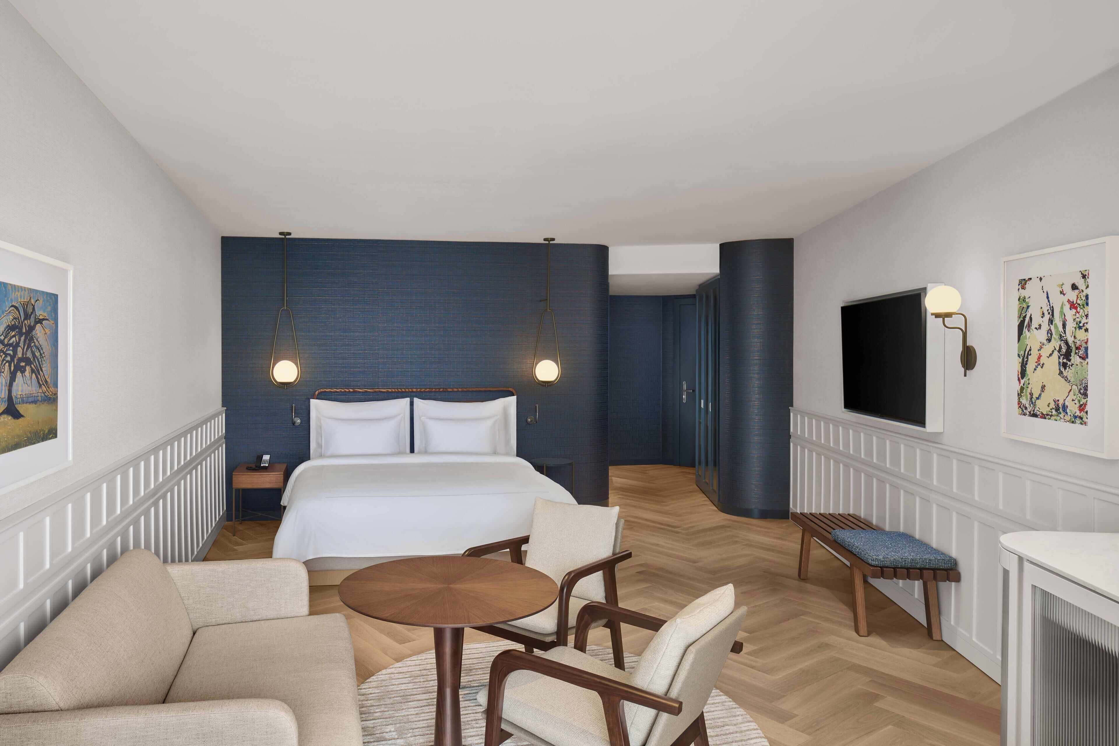 Deluxe-huone, merinäköala (Grand) | Ylelliset vuodevaatteet, minibaari, tallelokero huoneessa, työpöytä