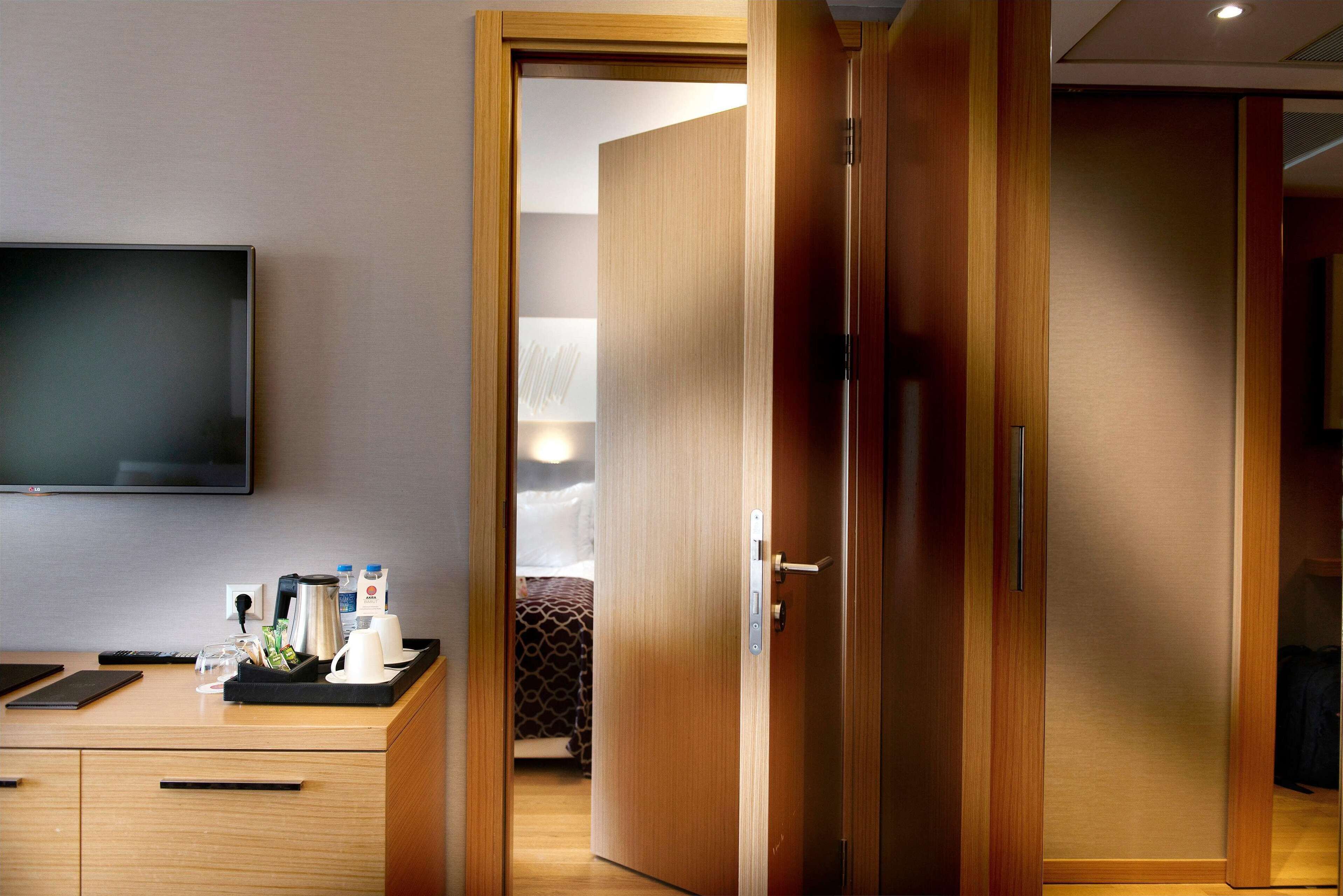 Ropa de cama de alta calidad, minibar, caja fuerte y escritorio