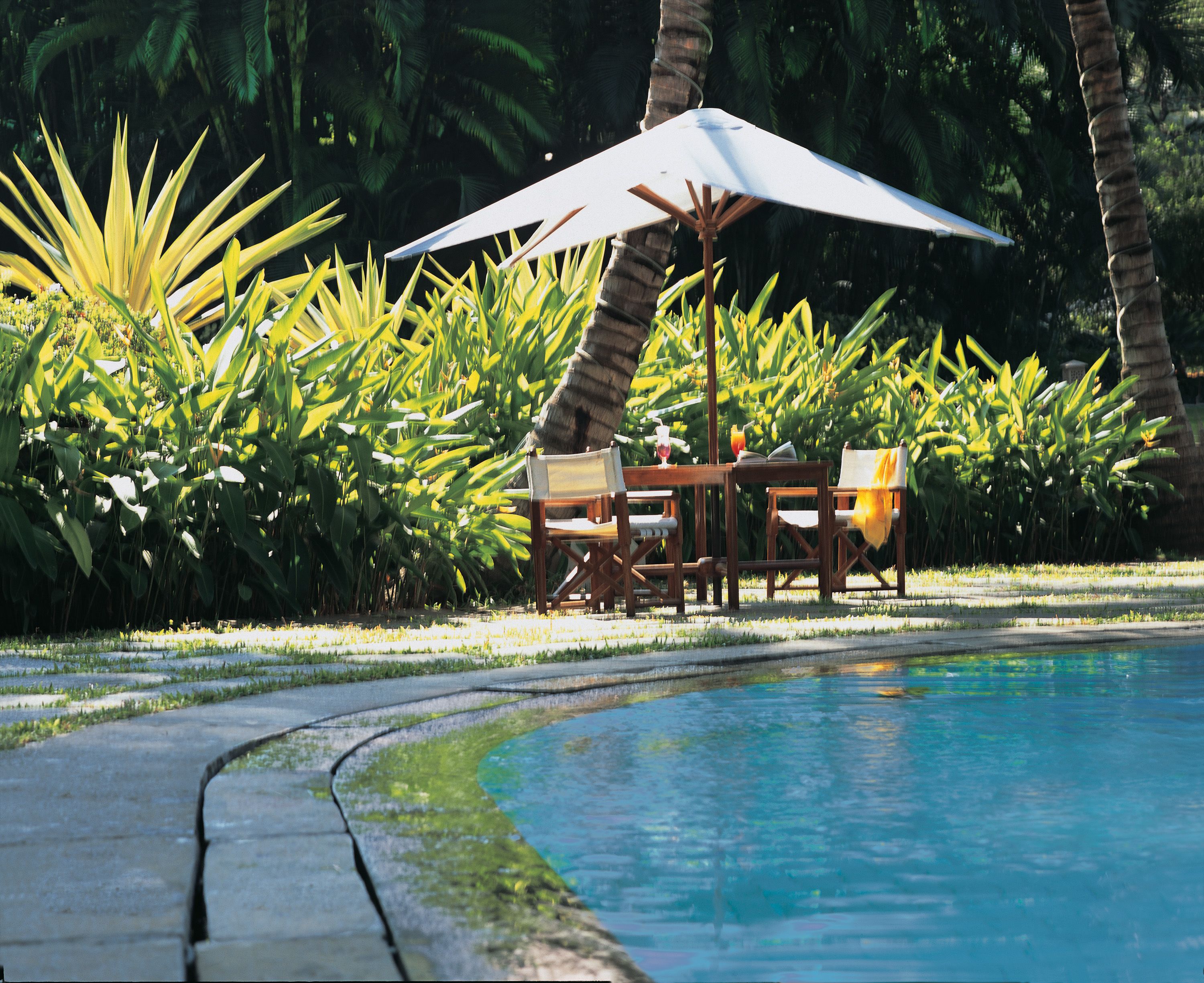 outdoor pool, pool umbrellas, pool loungers