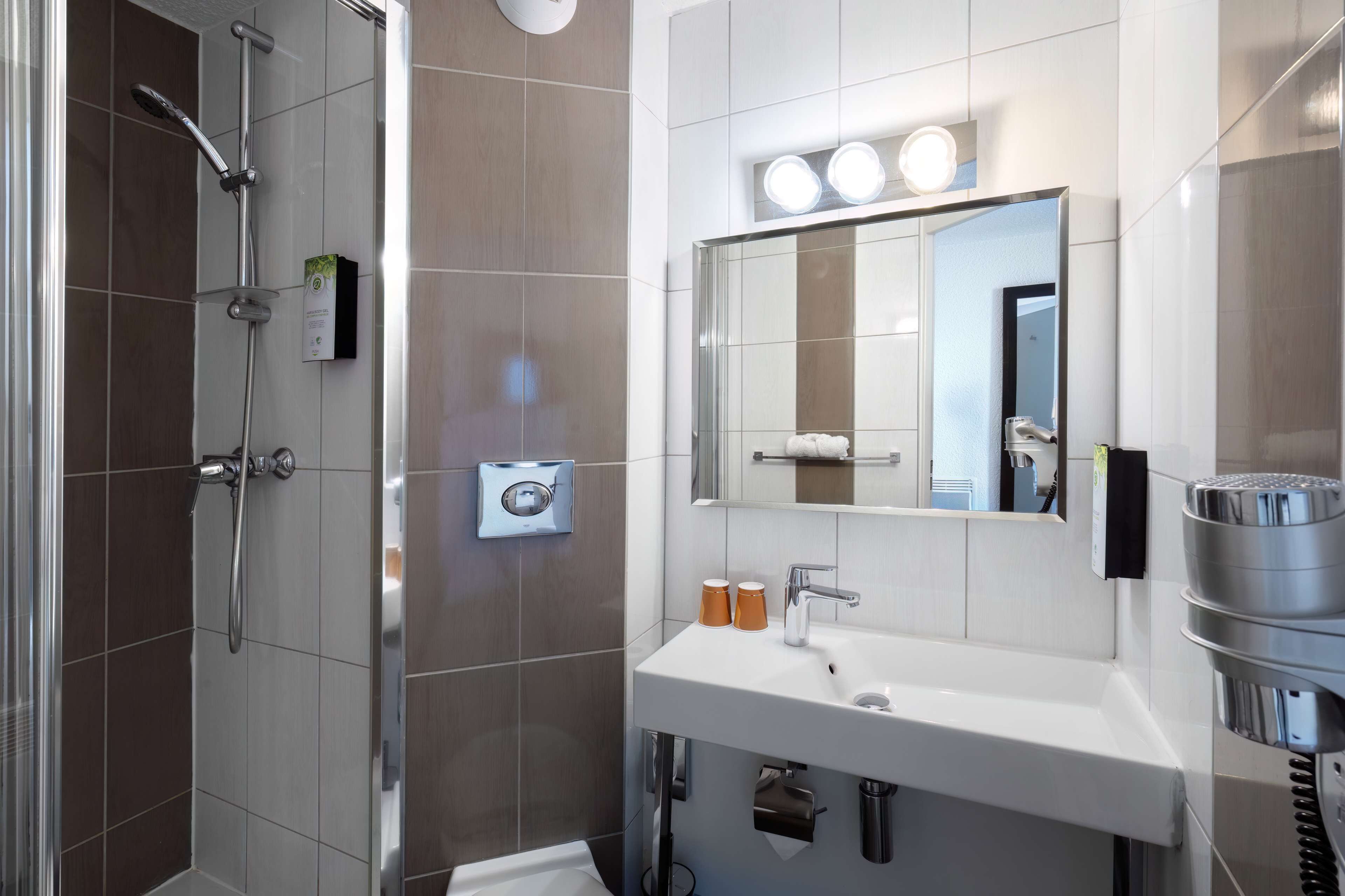 eco-friendly toiletries, hair dryer, towels, soap