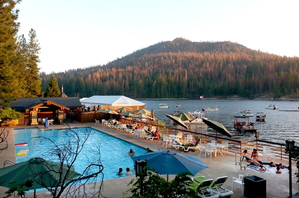 Seasonal outdoor pool, pool umbrellas, sun loungers