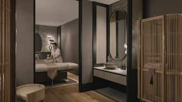 Bathroom features a large mirror, wooden vanity with a bowl sink, and a separate shower area.