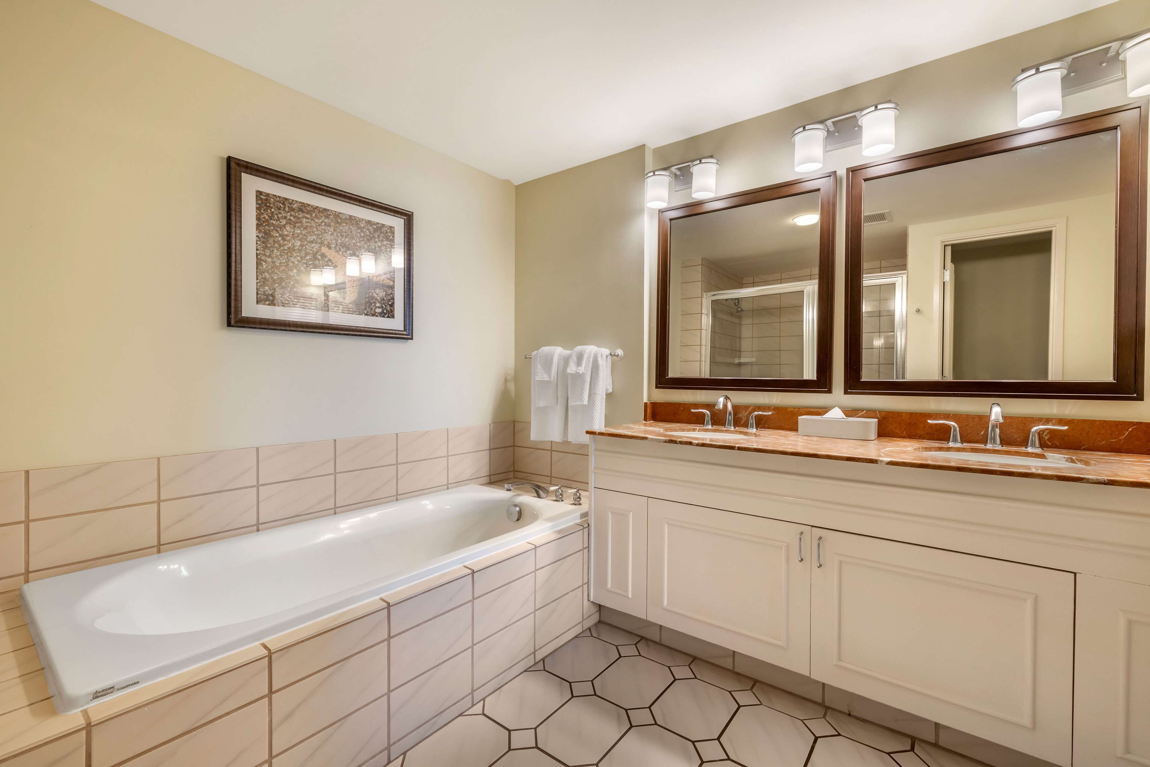 separate bathtub and shower, deep-soaking bathtub, free toiletries