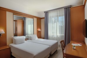 Ropa de cama de alta calidad y minibar 