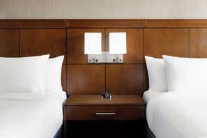 Hypo-allergenic bedding, pillow-top beds, desk, blackout curtains