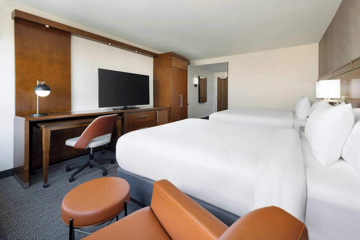 Hypo-allergenic bedding, pillowtop beds, desk, blackout drapes