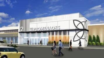 Un edificio moderno con un letrero llamativo que dice "2 Le Promenades".