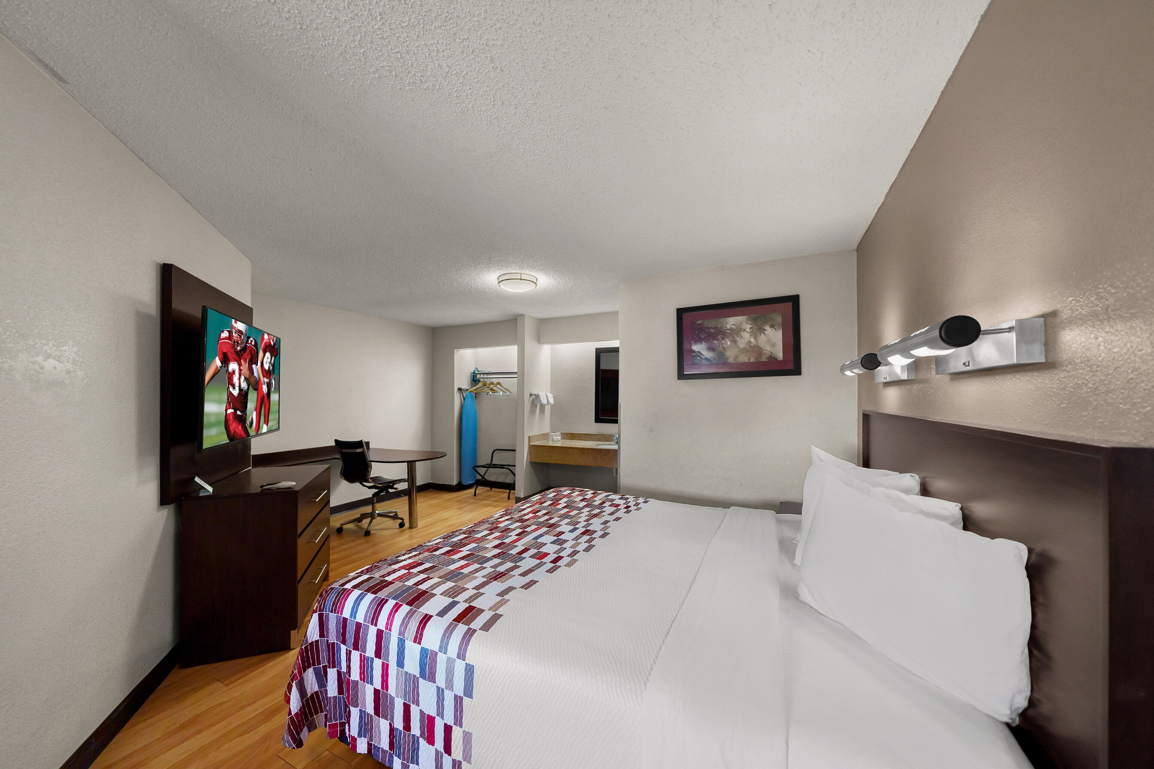 suite, 1 king bed, non smoking | 1 bedroom, desk, laptop workspace, blackout curtains