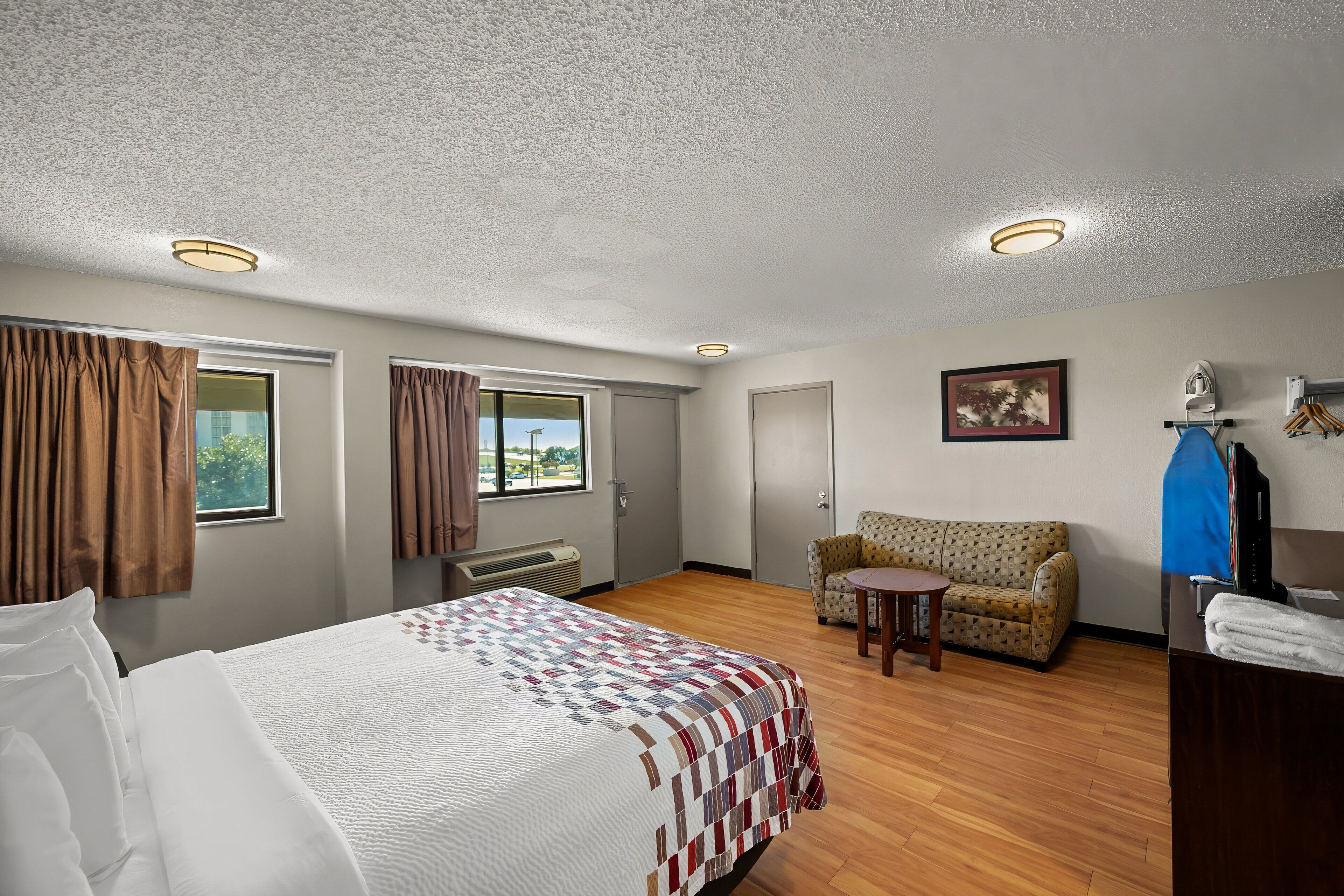 suite, 1 king bed, smoking | 1 bedroom, desk, laptop workspace, blackout curtains