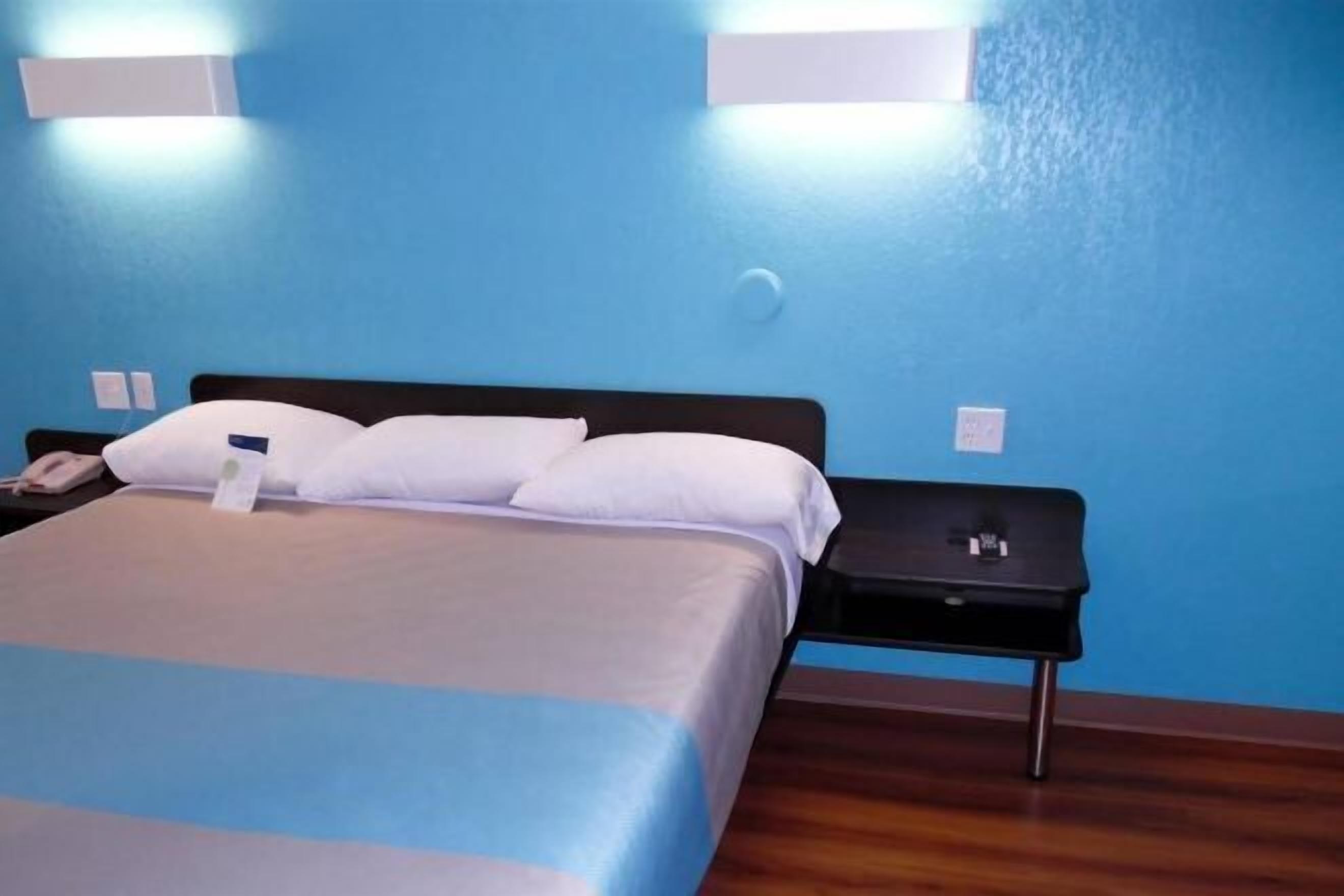 Desk, laptop workspace, free WiFi, bed sheets