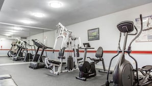 A gym with various exercise equipment, including treadmills, elliptical machines, and weight machines. - Comfort Inn Conyers (Conyers)