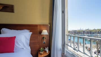 Premium bedding, pillow-top beds, desk, laptop workspace