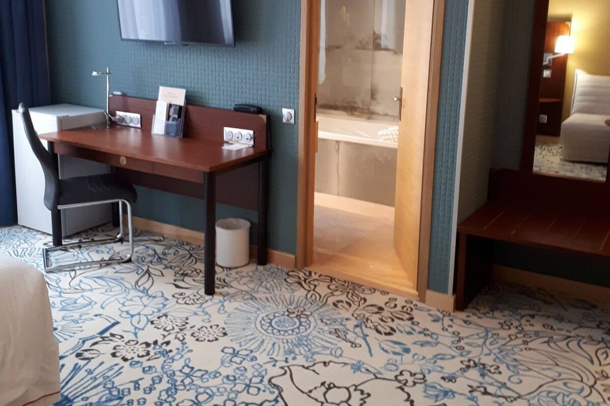 Premium bedding, pillowtop beds, desk, laptop workspace