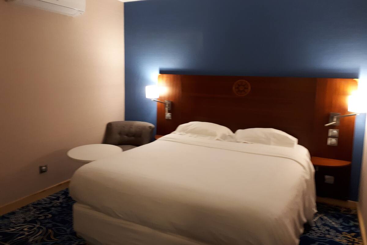 Premium bedding, pillowtop beds, desk, laptop workspace