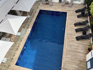 Seasonal outdoor pool, sun loungers