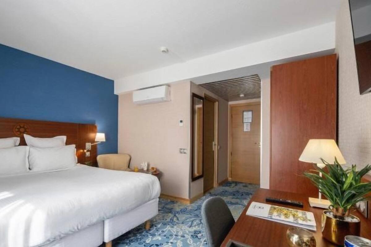 Premium bedding, pillowtop beds, desk, laptop workspace