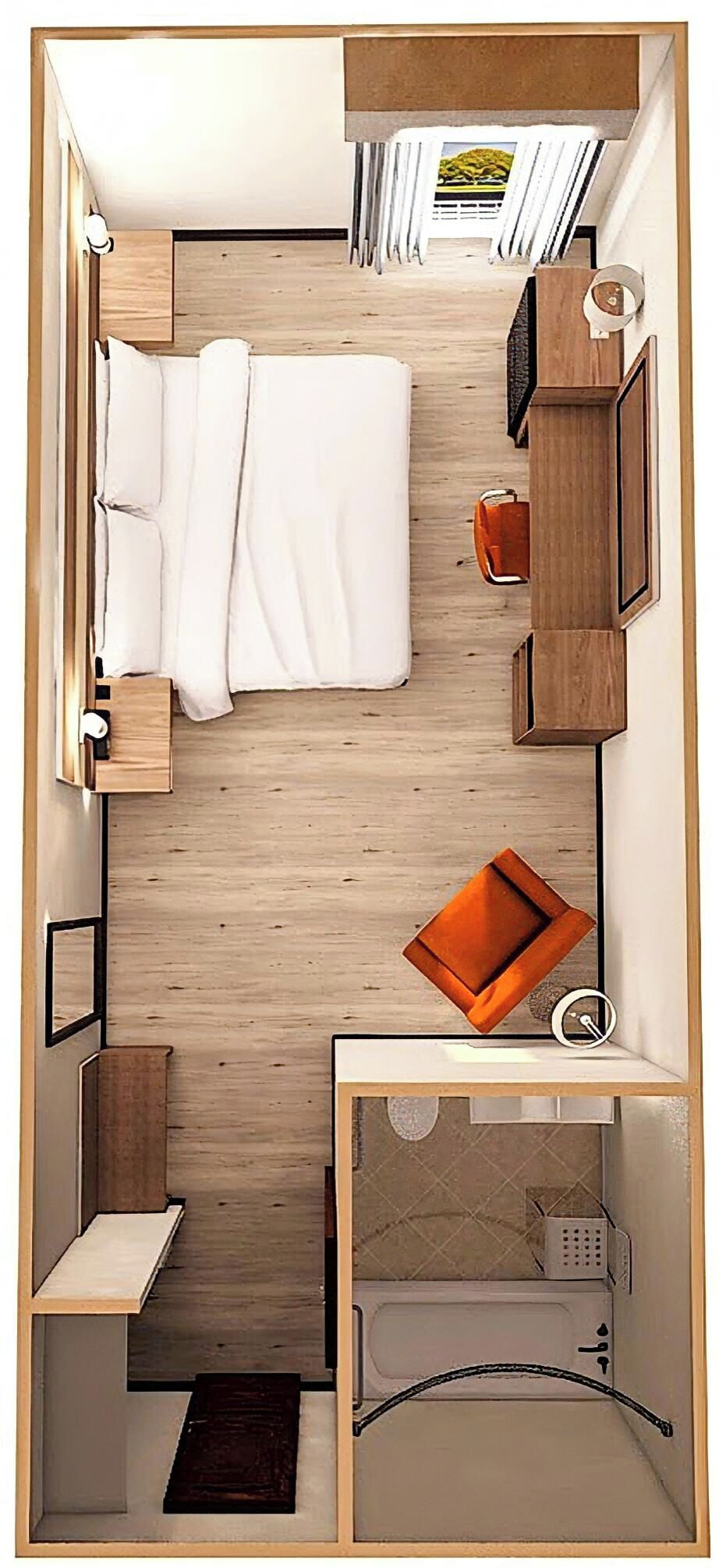 Ein gemütlicher Raum mit Bett, einer kleinen Sitzecke, einem Waschbecken und einer kompakten Toilette.