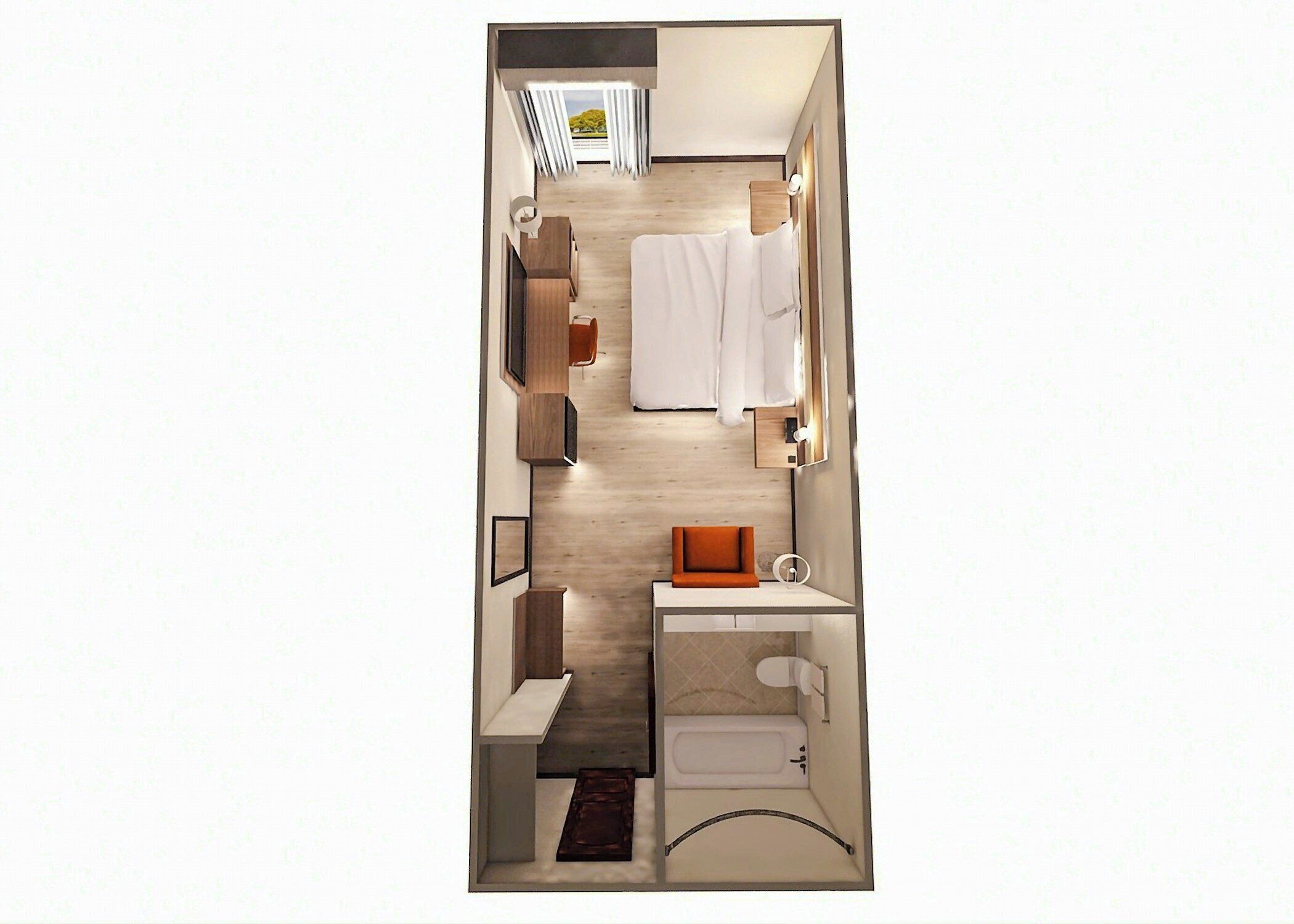 A compact room with a bed, a small seating area, a vanity, a toilet, and a window with curtains.