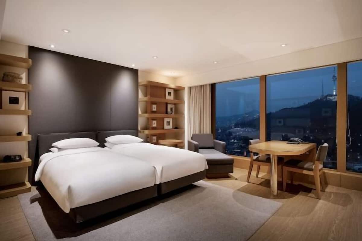 Premium bedding, down duvets, minibar, in-room safe