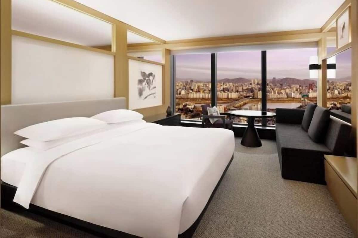 Premium bedding, down duvets, minibar, in-room safe