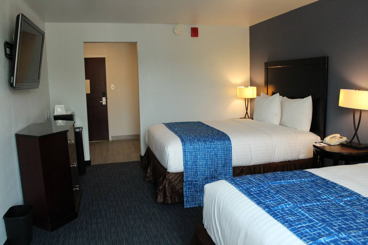 Premium bedding, pillowtop beds, blackout drapes, iron/ironing board