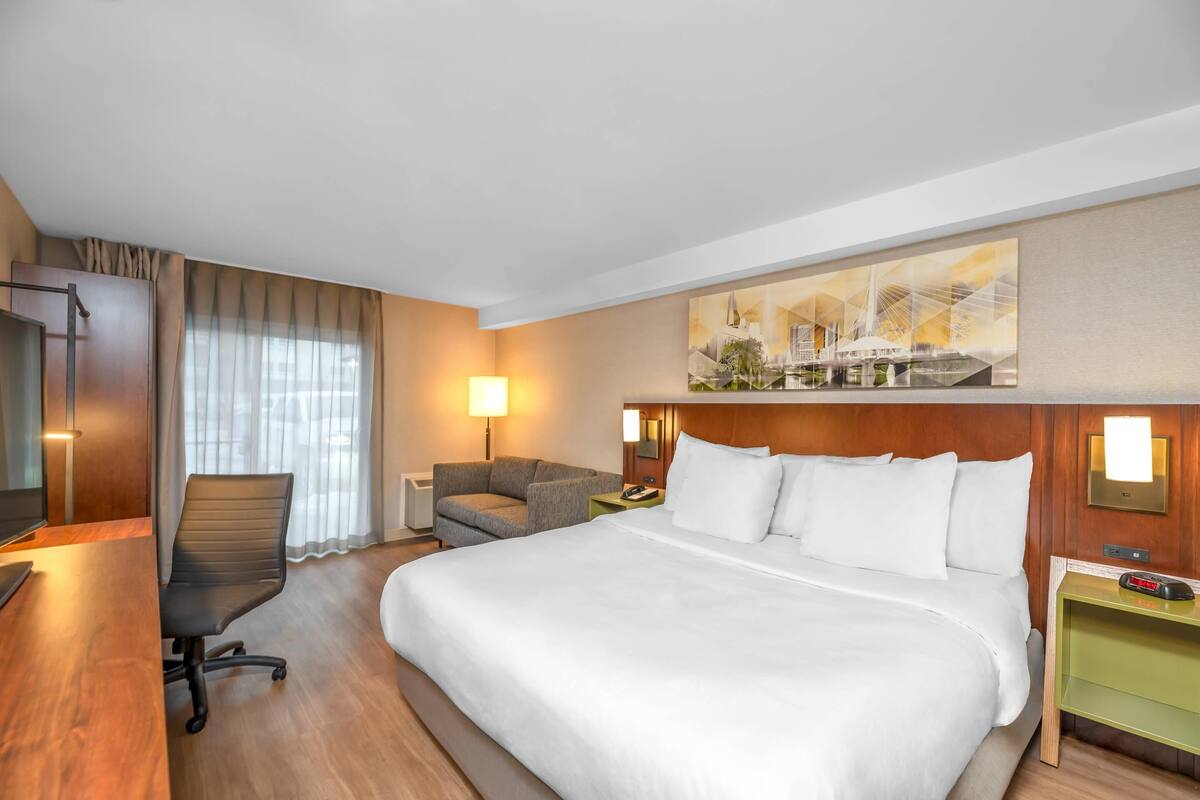 Premium bedding, pillow-top beds, desk, blackout curtains