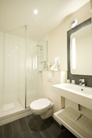 Shower, eco-friendly toiletries, hair dryer, towels