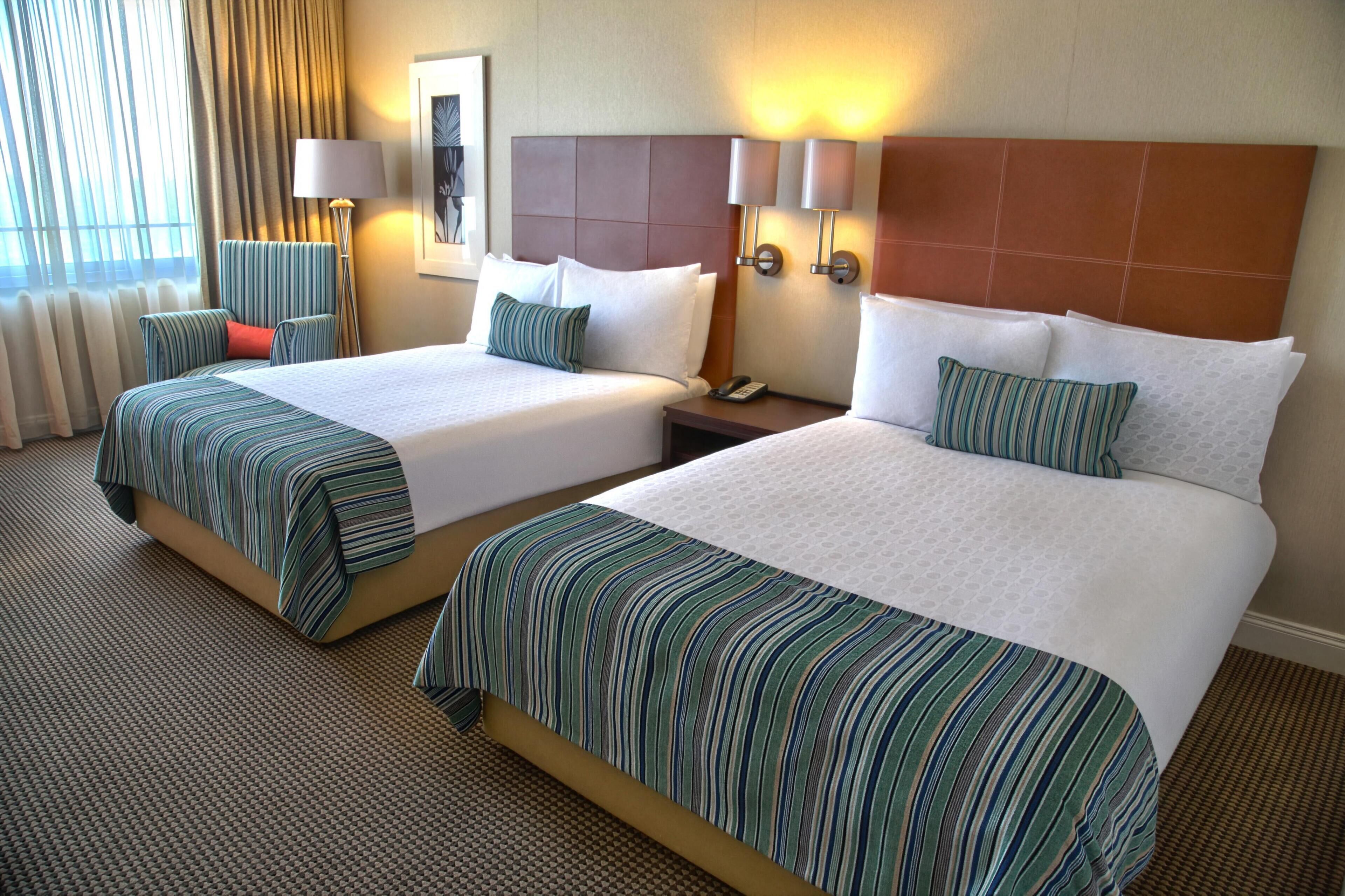 Superior Twin Room | Minibar, in-room safe, desk, laptop workspace