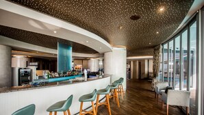 3 bars/lounges, poolside bar