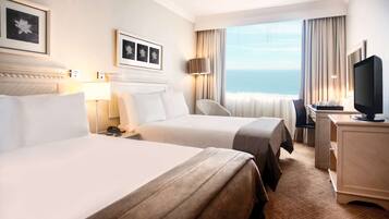 Superior Twin Room | Minibar, in-room safe, desk, laptop workspace