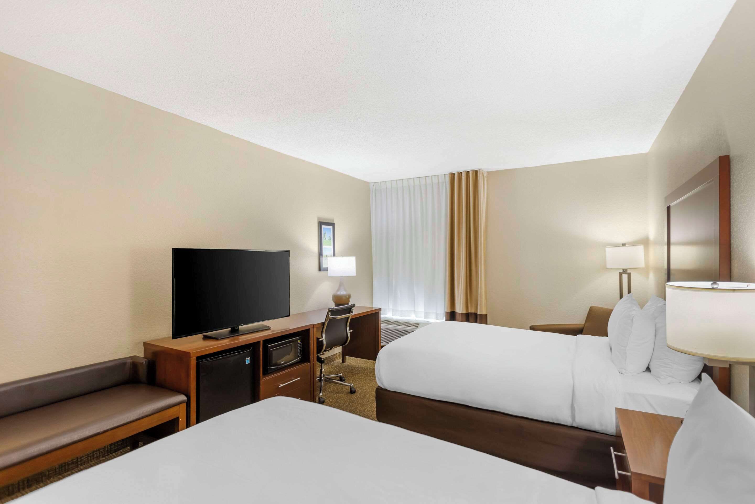 premium bedding, down duvets, pillow-top beds, iron/ironing board