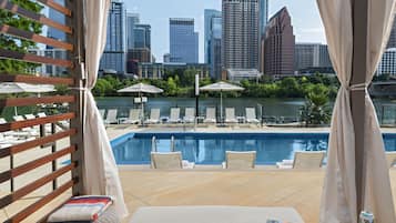 Outdoor pool, open 9:00 AM to 10:00 PM, cabanas (surcharge)