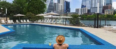 Outdoor pool, open 9:00 AM to 10:00 PM, pool cabanas (surcharge)