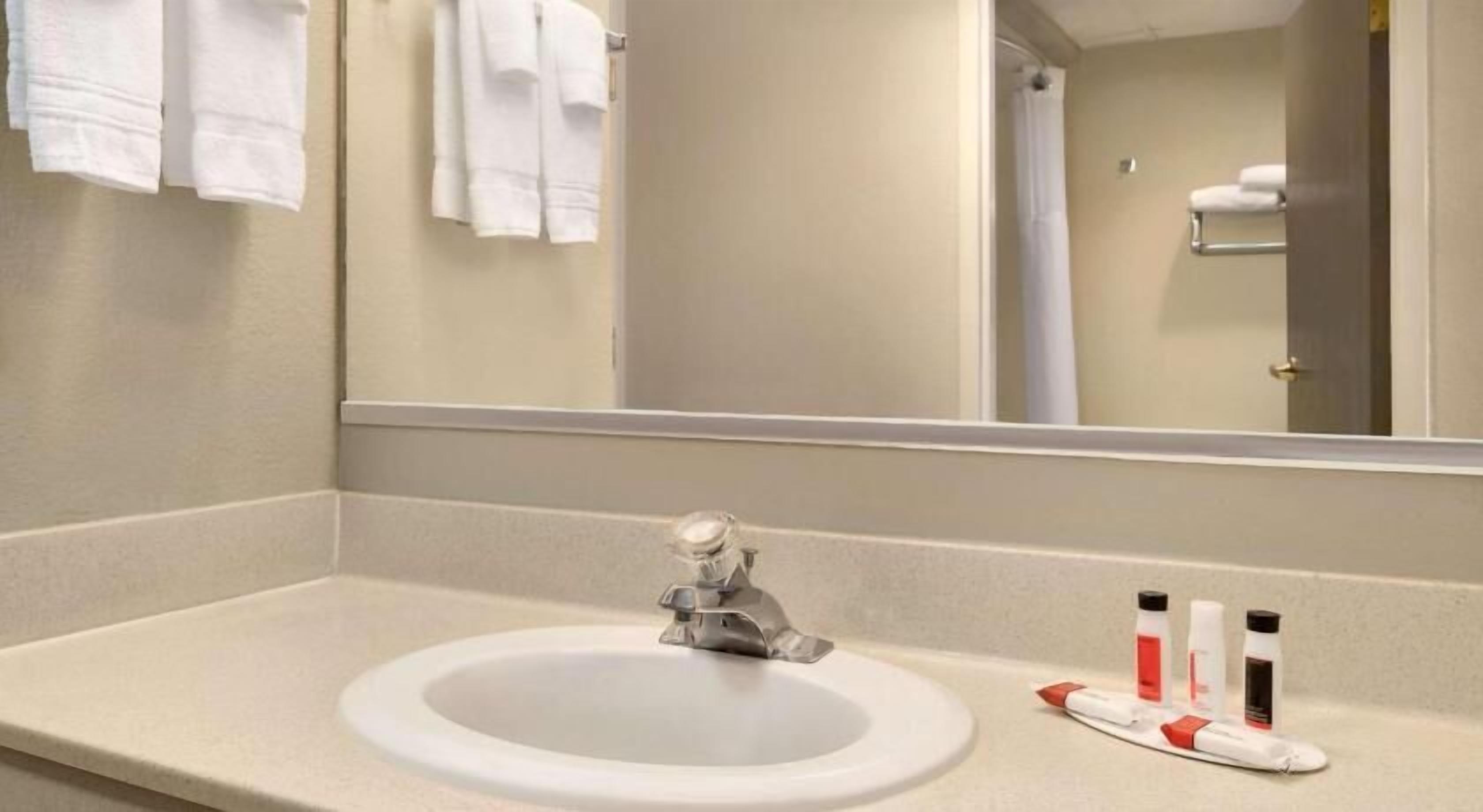 Bathroom | Bathtub, free toiletries, hair dryer, towels