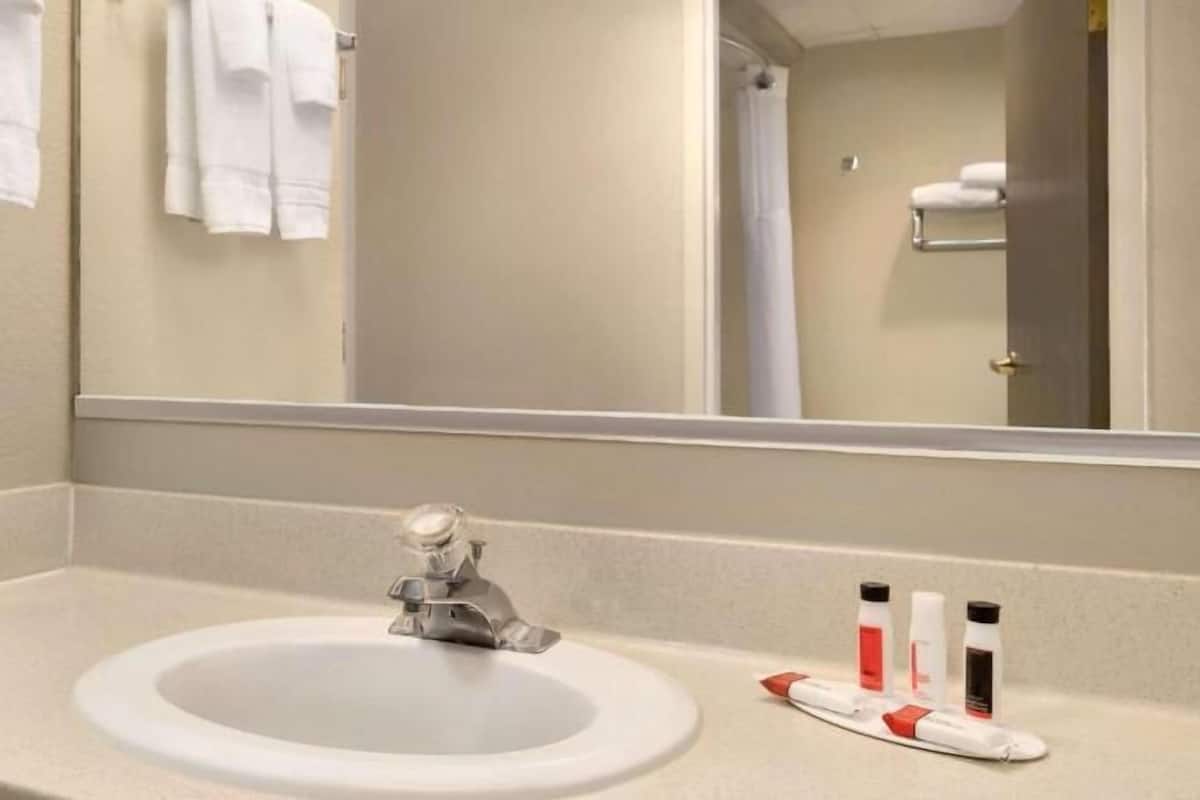Bathroom | Bathtub, free toiletries, hair dryer, towels