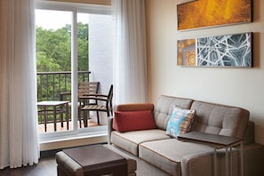 Suite, 1 Bedroom (Balcony) | Living room | 55-inch Smart TV with cable channels, TV, pay movies