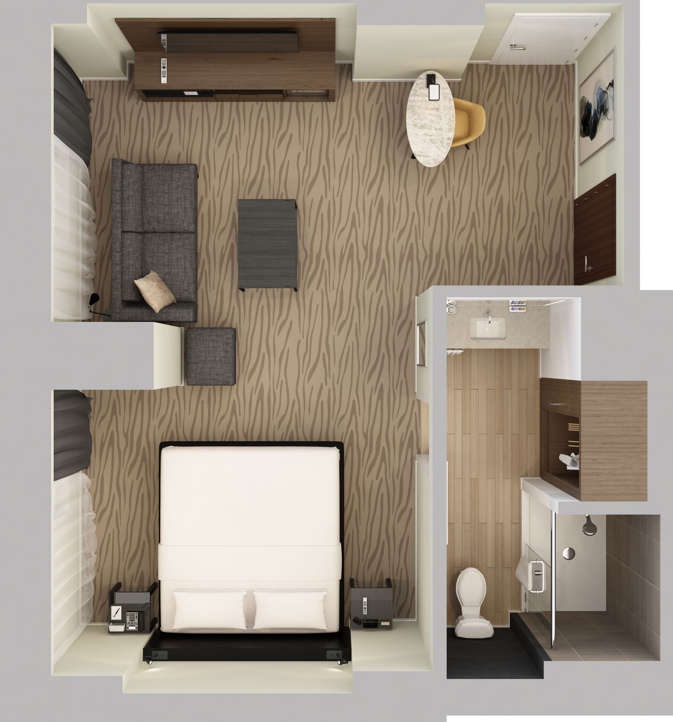 Et moderne hotelværelse med en stor seng, en sofa, et lille bord og et badeværelse med toilet og håndvask.