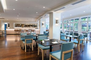 Lunch, dinner served; local cuisine, pool views 