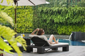Outdoor pool, open 7:00 AM to 8:00 PM, sun loungers