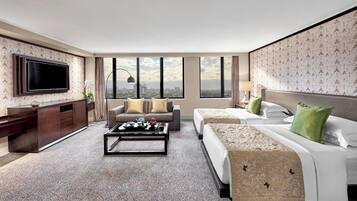 Premium bedding, down comforters, pillowtop beds, minibar