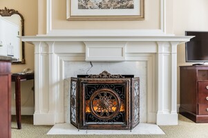 Suite, Non Smoking, Fireplace | Living area | 40-inch LCD TV with cable channels, TV