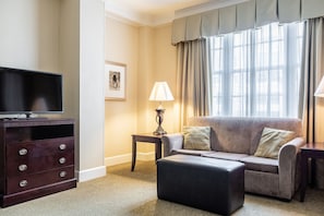 Suite, Non Smoking, Fireplace | Living area | 40-inch LCD TV with cable channels, TV