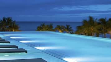 Outdoor pool, open 8 AM to 10:00 PM, cabanas (surcharge), pool umbrellas