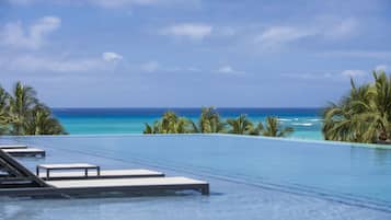 Outdoor pool, open 8 AM to 10:00 PM, cabanas (surcharge), pool umbrellas